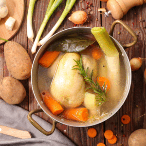 Broth in bowl with vegetables